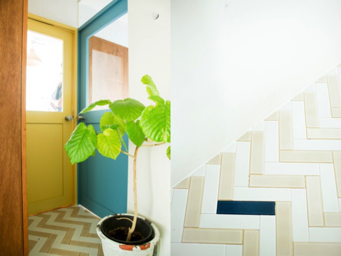 寝室の扉の色がカラフル、ガラス張りで気配が伝わってくる（左）。玄関から続く廊下もヘリンボーン柄にタイルが貼られている（右）。